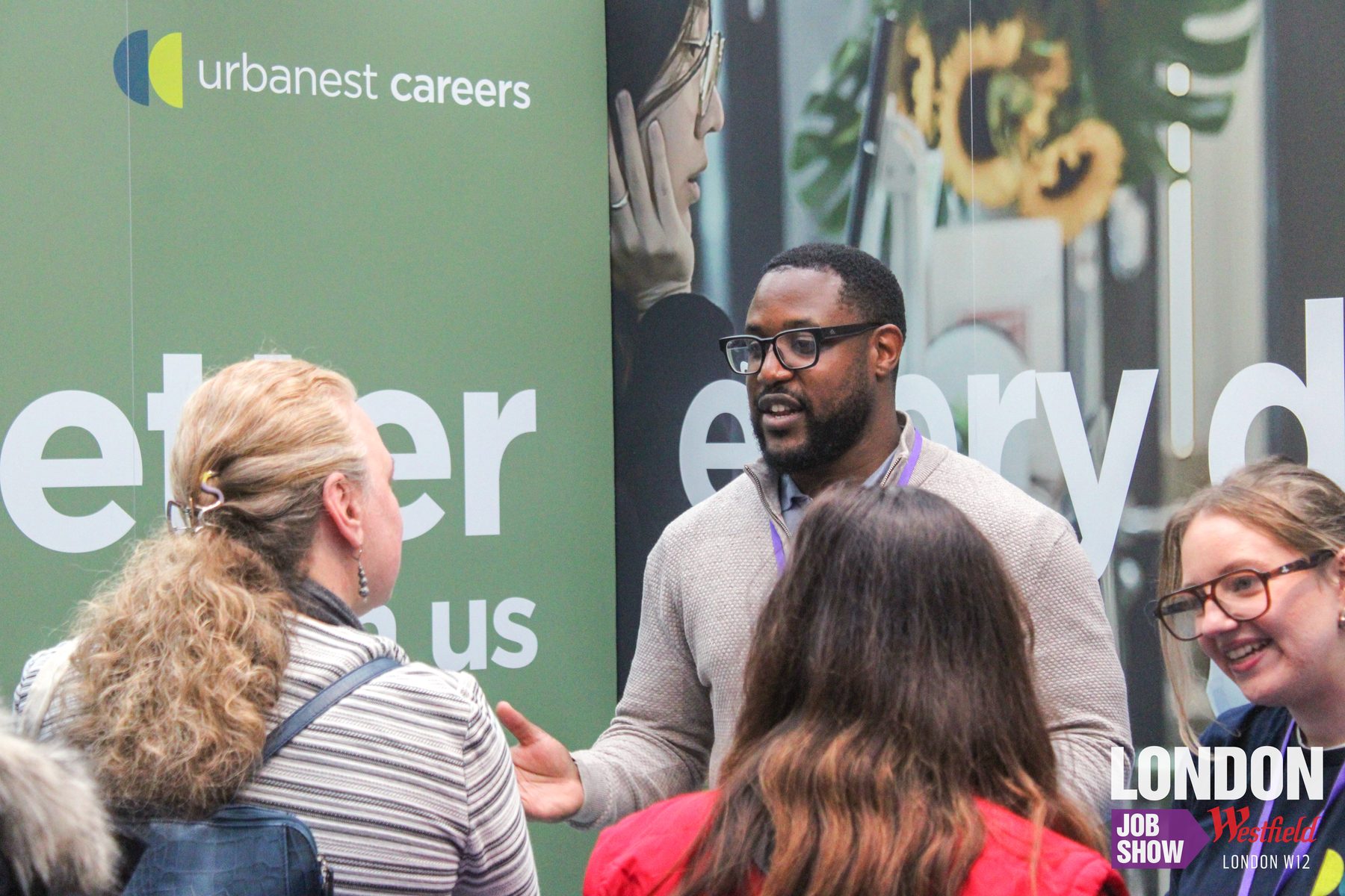 A candidate talking with an employer at their stand at the London Job Show