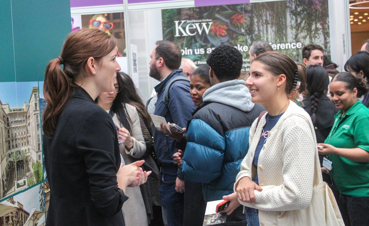 A candidate talking with an employer at their stand at the London Job Show